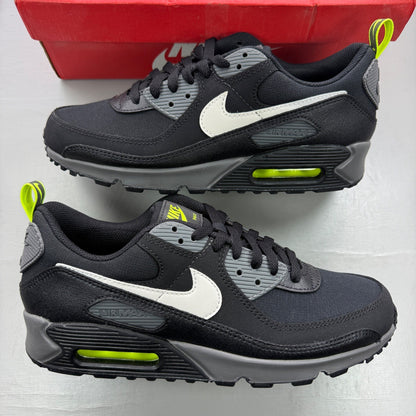 Nike trainers black with neon volt accents and white-grey detailing, featuring iconic logo.