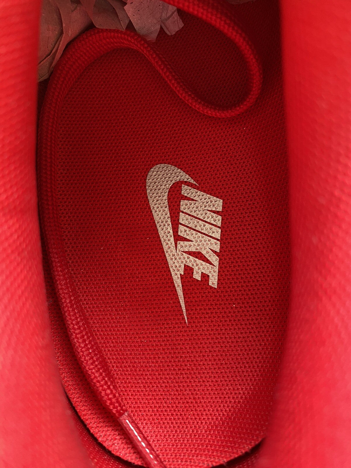 Nike Air Max Mercurial 98 trainers university red with white accents and signature logo.