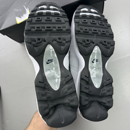 Nike Air Max 95 Ultra grey trainers with black and white accents, mesh and leather material.