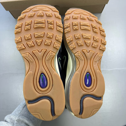 Nike Air Max 97 trainers blue with obsidian navy accents and signature swoosh logo.