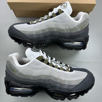 Nike Air Max 95 grey trainers with big bubble sole and logo detailing.