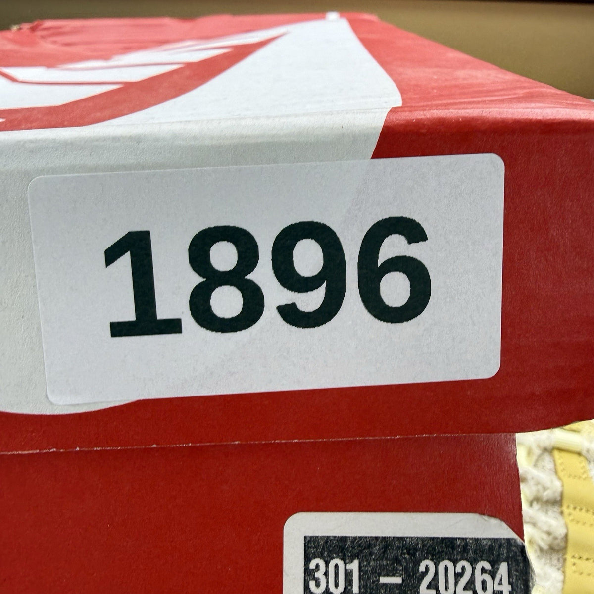Nike Air Max 95 trainers yellow with textured upper and signature swoosh logo.