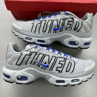Nike Air Max Plus TN trainers grey with blue accents and signature swoosh logo.