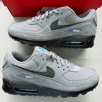 Nike Air Max 90 grey trainers with light blue accents and signature logo.