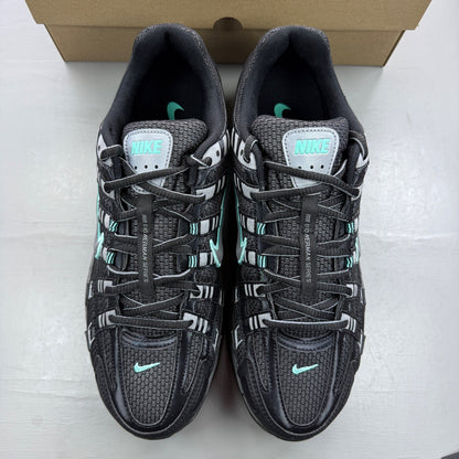 Nike black trainers with grey and turquoise accents, featuring a sleek mesh upper.