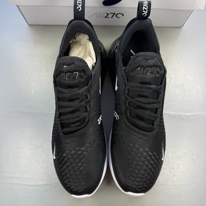 Nike black Air Max 270 trainers with white accents and logo detail.