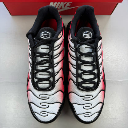 Nike Air Max Plus TN red with pure platinum accents and iconic logo detail.