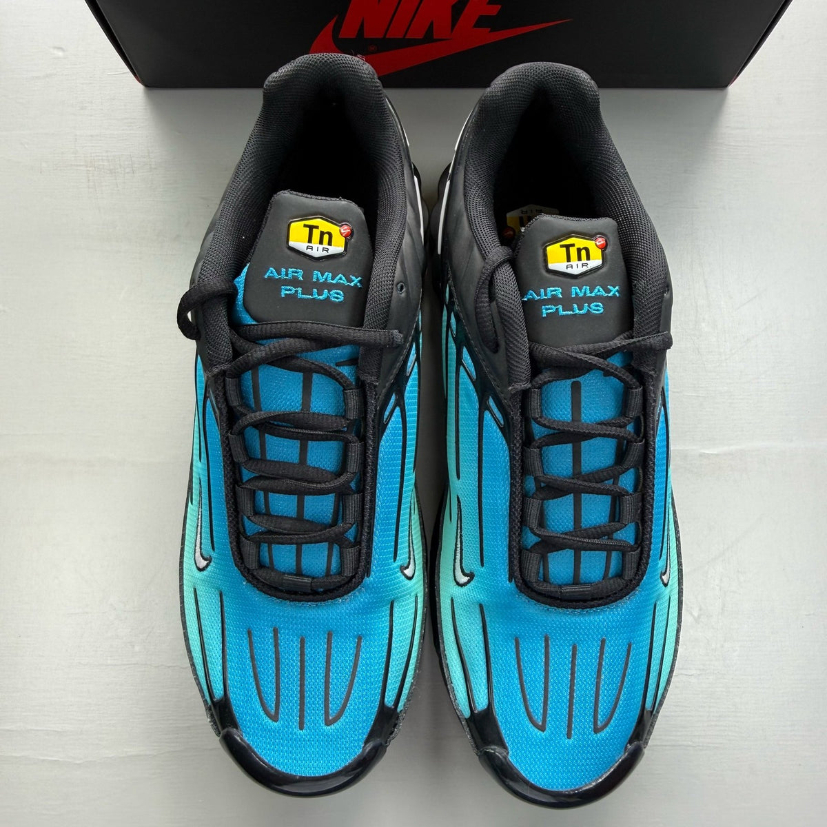 Nike Air Max Plus TN 3 blue trainers with aqua gradient and signature logo.