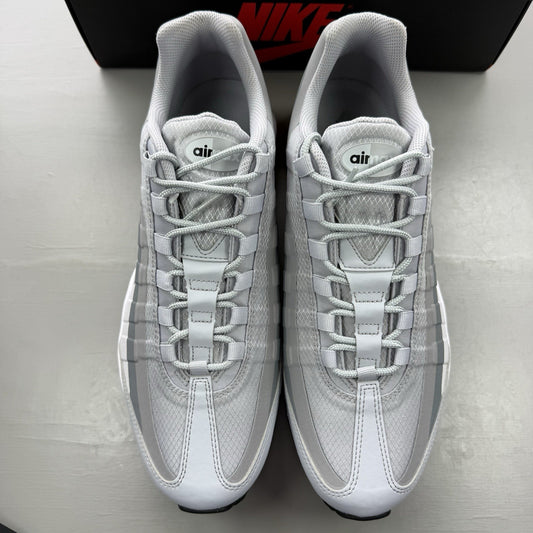 Nike Air Max 95 Ultra grey trainers with black and white accents, mesh and leather material.