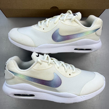 Nike Air Max Oketo white trainers with bubble pack design and logo detail.