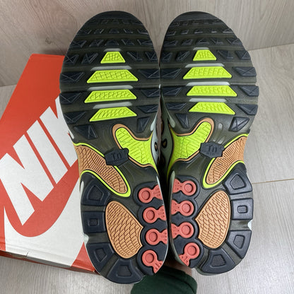 Nike Air Max Plus TN trainers silver with volt accents and signature logo details.