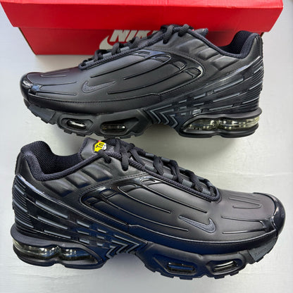 Nike Air Max Plus TN 3 black leather trainers with distinctive wave pattern and logo.