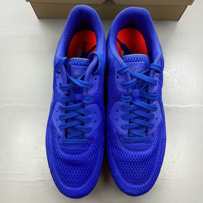 Nike Air Max 90 blue trainers with breathable mesh upper and signature swoosh logo.