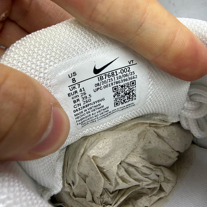 Nike Air Max 95 Ultra white trainers with grey accents and signature logo details.