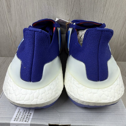 Adidas Ultra Boost 22 trainers in legacy indigo with turbo blue and white accents.