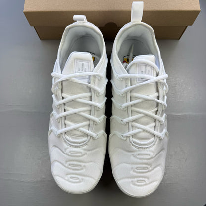 Nike white trainers with Pure Platinum accents and signature logo detailing.