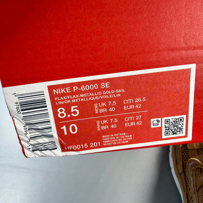 Nike P-6000 SE trainers multi-colour with metallic gold accents and mesh detailing.