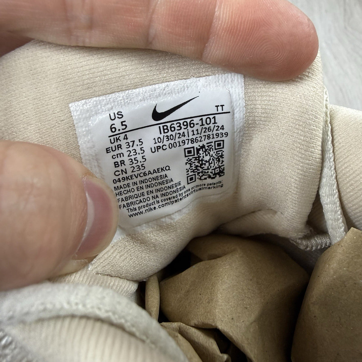 Nike Air Max 95 OG trainers beige with big bubble sole and logo detailing.
