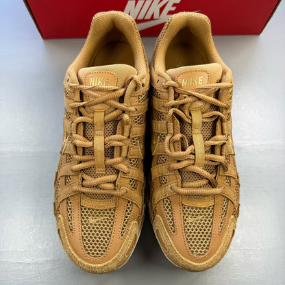 Nike P-6000 SE trainers multi-colour with metallic gold accents and mesh detailing.