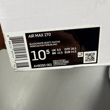 Nike deck shoes white with black accents and logo, featuring a sleek design.