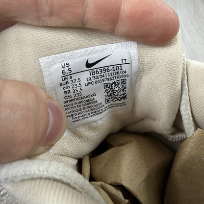 Nike Air Max 95 OG trainers beige with big bubble sole and logo detailing.