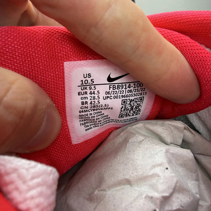 Nike Air Max 1 white trainers with LeBron James logo and Liverpool FC details.