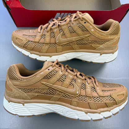 Nike P-6000 SE trainers multi-colour with metallic gold accents and mesh detailing.