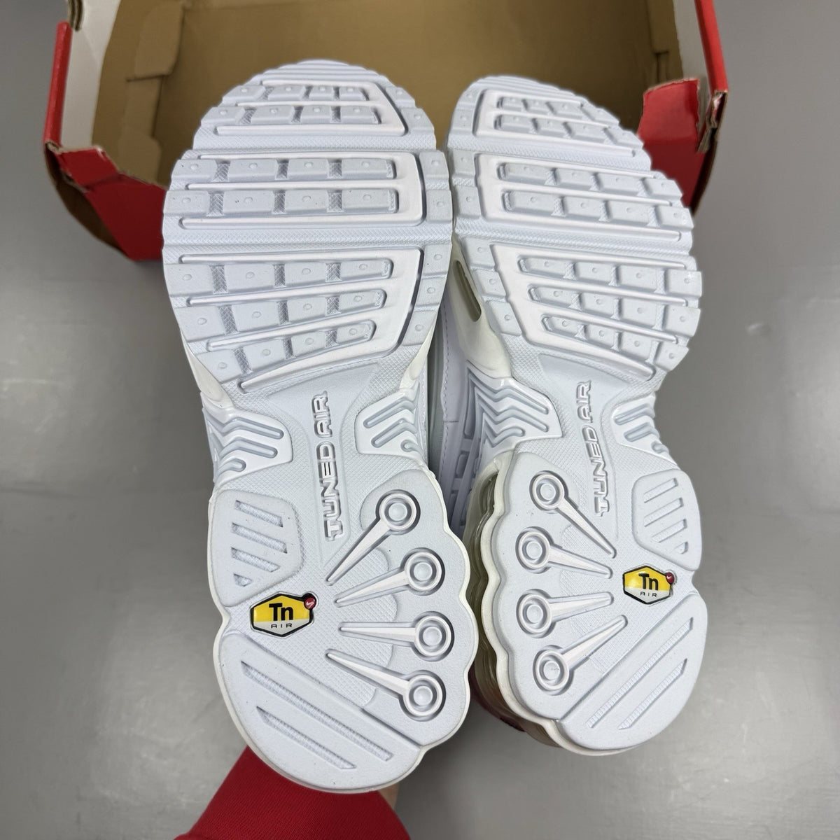 Nike Air Max Plus 3 white trainers with multi Swoosh logo and breathable mesh upper.