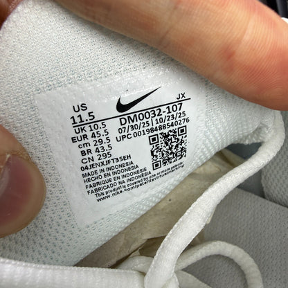 Nike running shoes white with Signal Blue accents and Air Max cushioning.