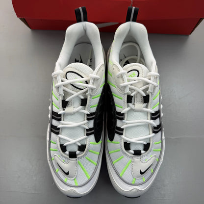 Nike Air Max 98 white trainers with electric green accents and mesh material.