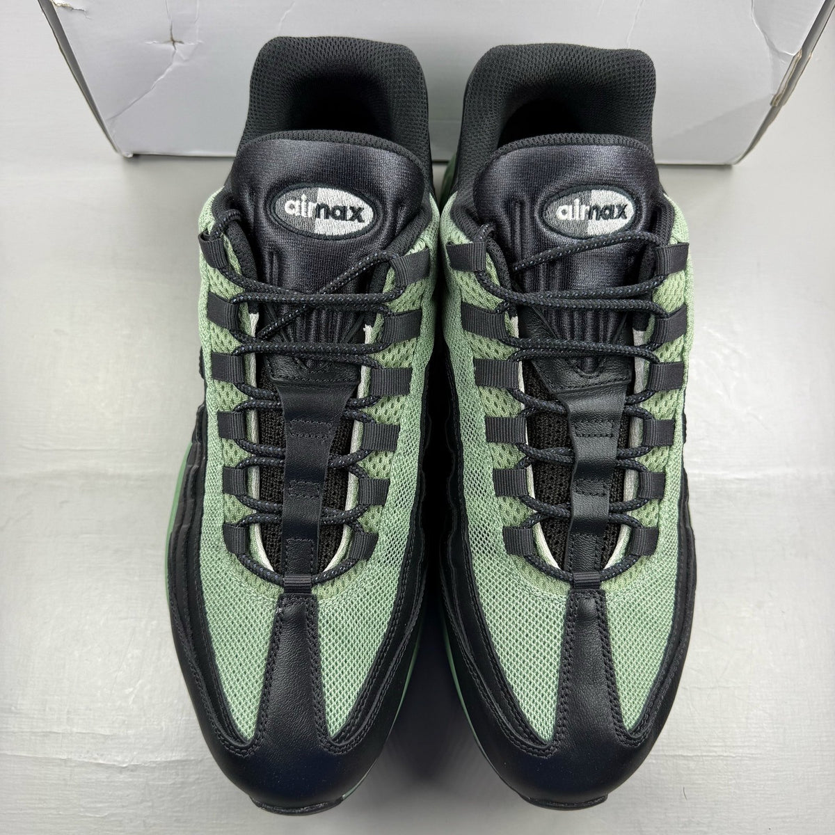 Nike Air Max 95 ID green trainers with grey accents and black detailing.