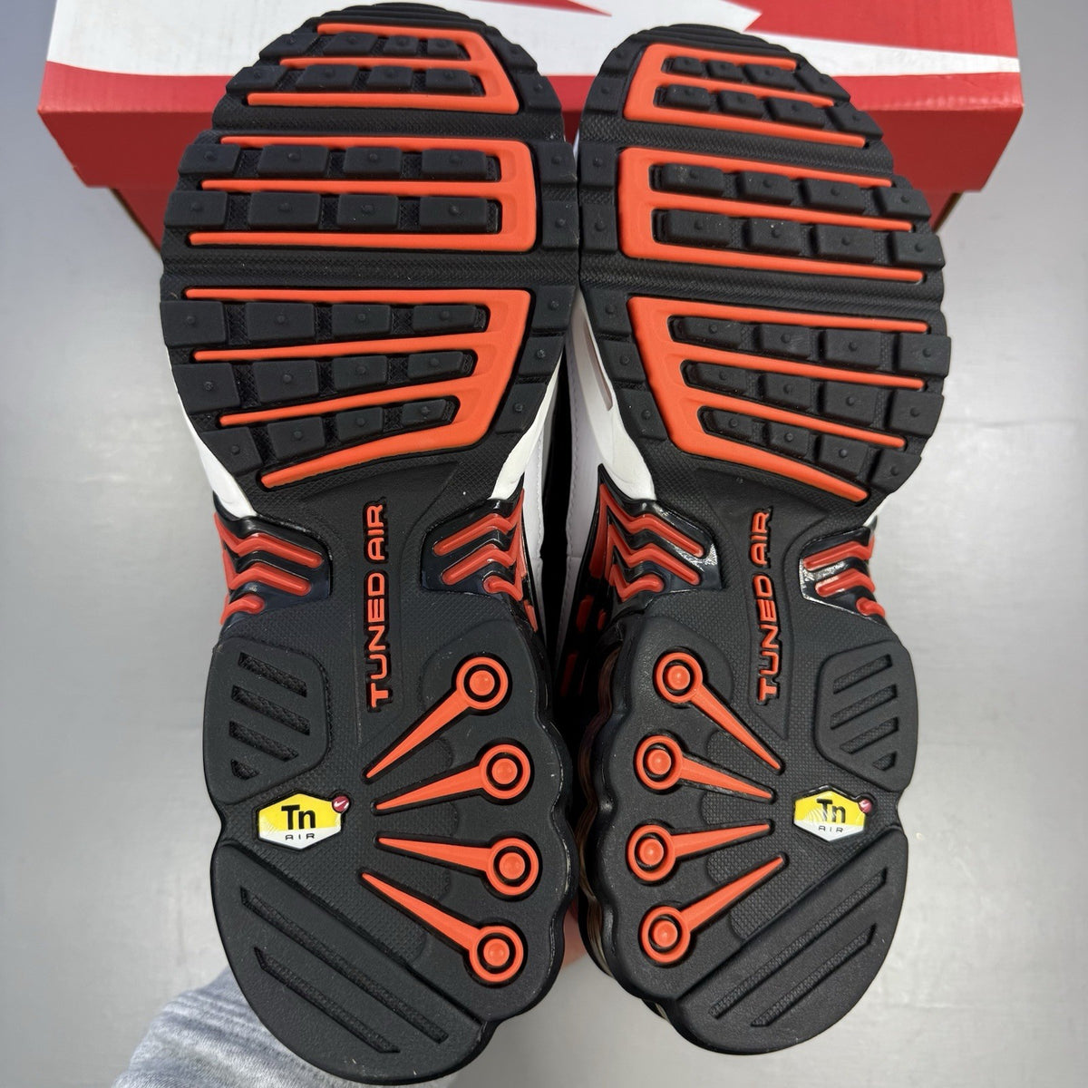Nike Air Max Plus TN 3 white trainers with black and team orange accents, logo detail.