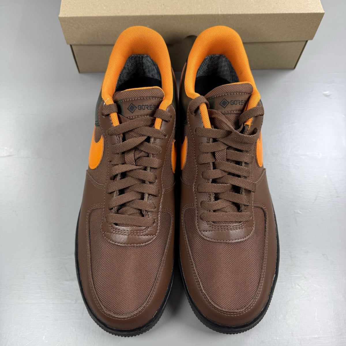 Nike Air Force 1 Low Gore-Tex brown sneaker with bright ceramic accents and logo.