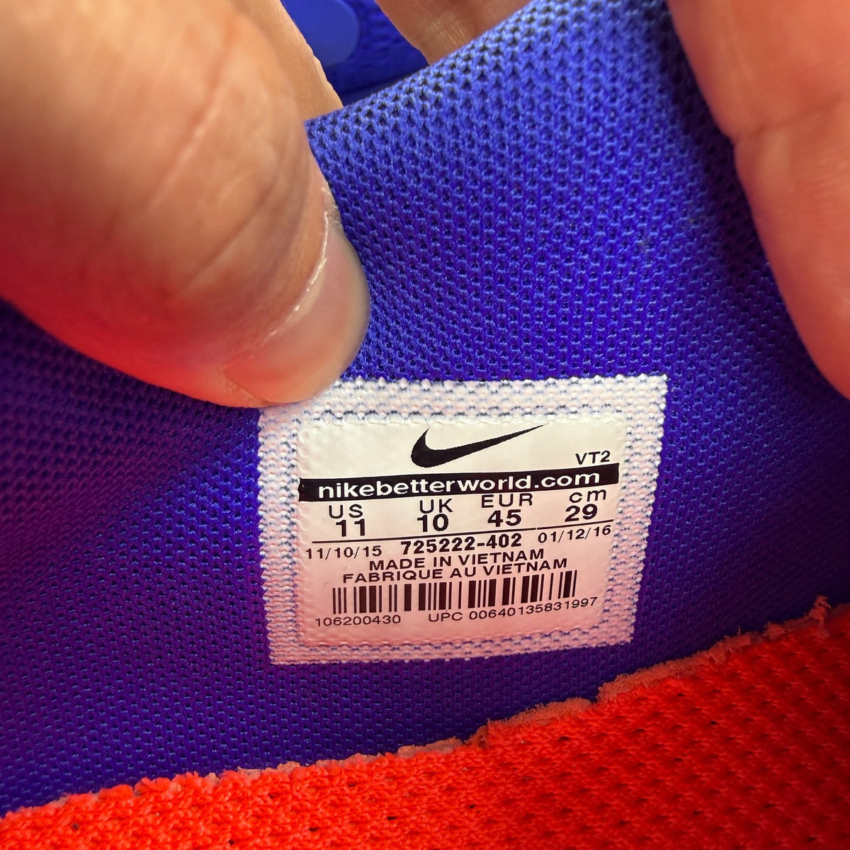 Nike Air Max 90 blue trainers with breathable mesh upper and signature swoosh logo.