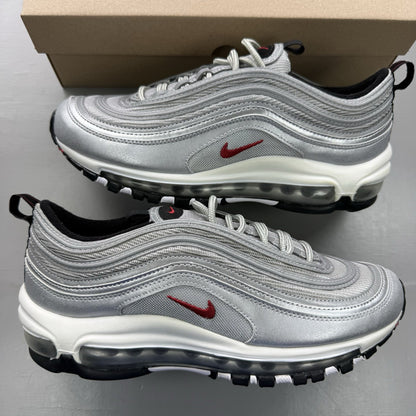 Nike Air Max 97 silver trainers with metallic finish and signature swoosh logo.