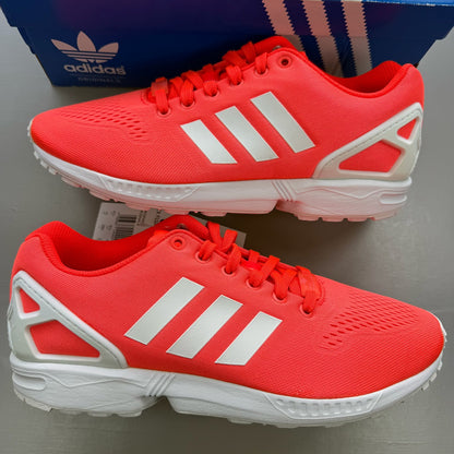 Adidas ZX Flux EM red trainers with white accents and textured mesh upper.