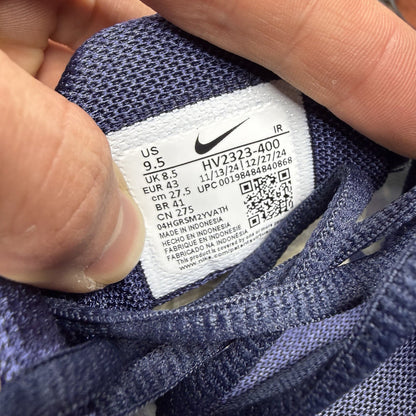 Nike Air Max Plus trainers blue with unique lightning pattern and signature logo.