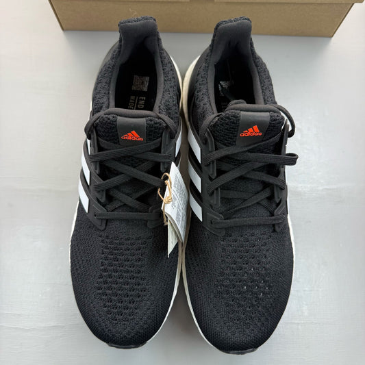 Adidas black Ultra Boost 5.0 trainers with white accents and logo detailing.