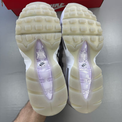 Nike Air Max 95 OG Big Bubble white trainers with hydrangea pattern and logo details.