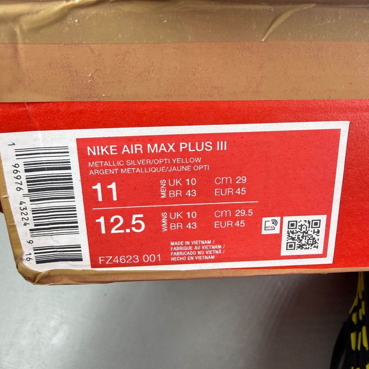 Nike Air Max Plus 3 TN metallic silver with yellow accents and logo details.
