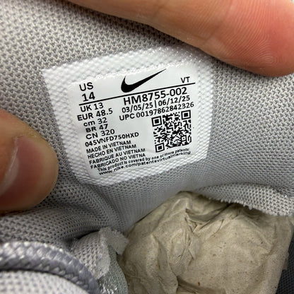 Nike Air Max 95 white trainers with big bubble sole and reflective detailing.