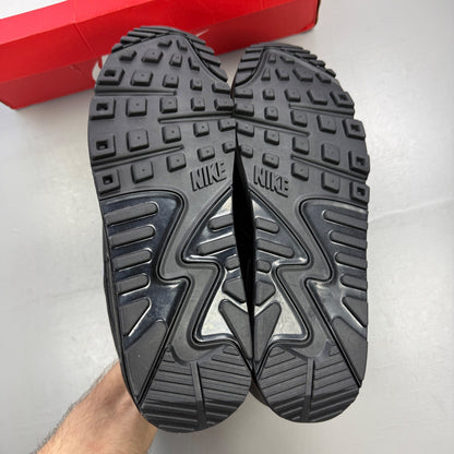 Nike deck shoes black with sapphire accents and signature swoosh logo.