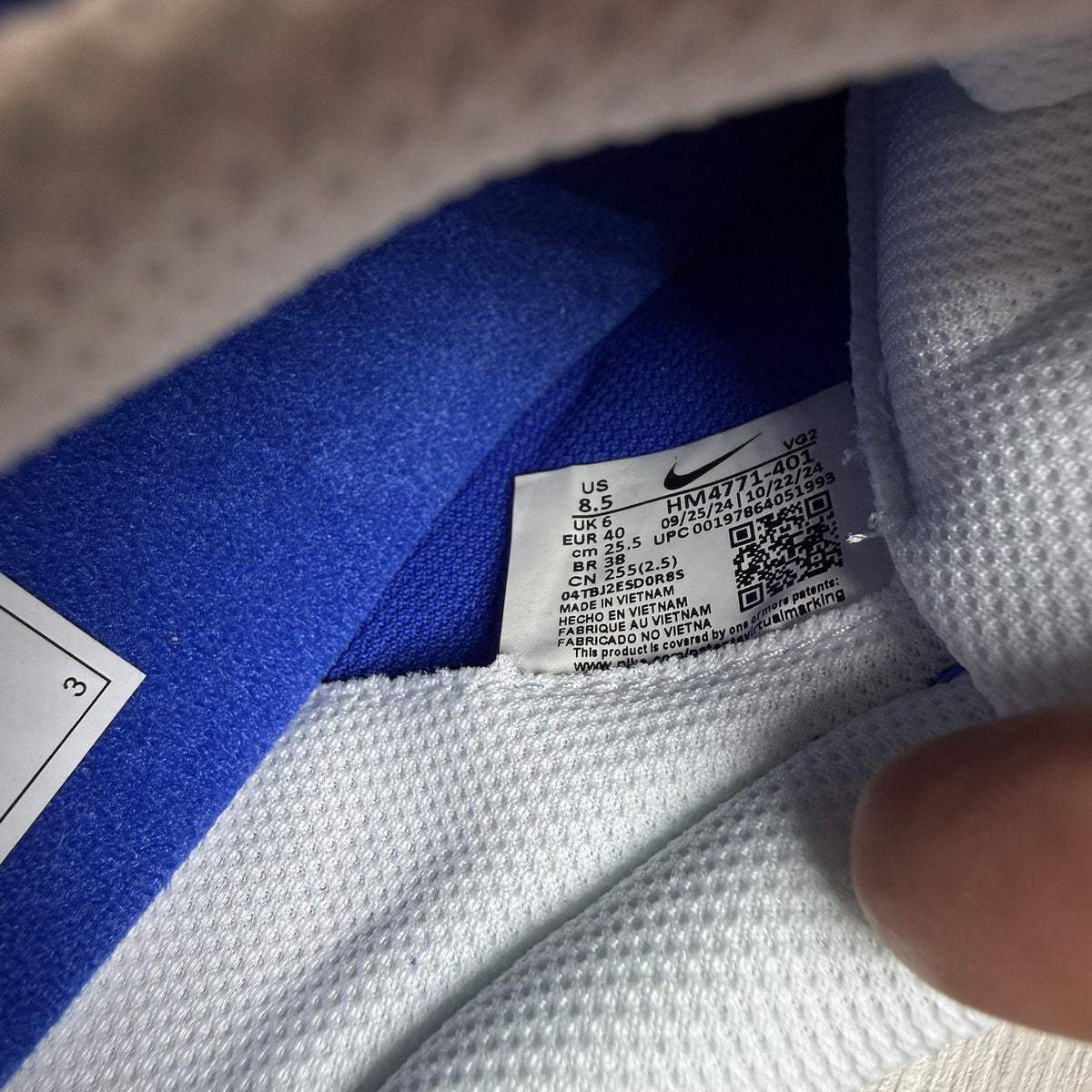 Nike trainers game royal blue with white and black accents, featuring logo detail.