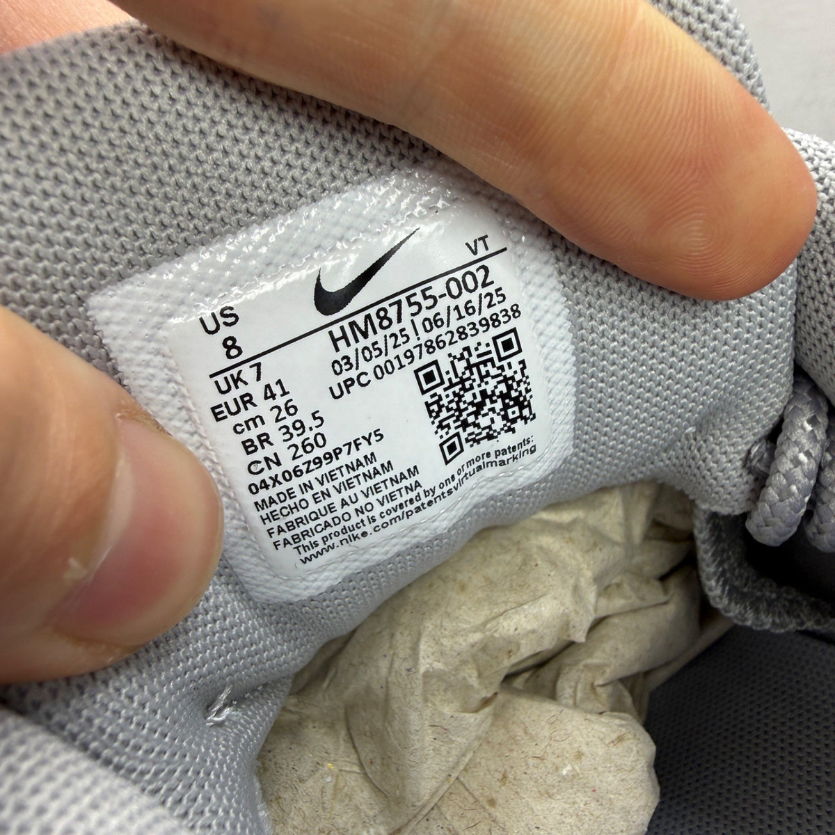 Nike grey deck shoes with big bubble sole and classic logo detail.