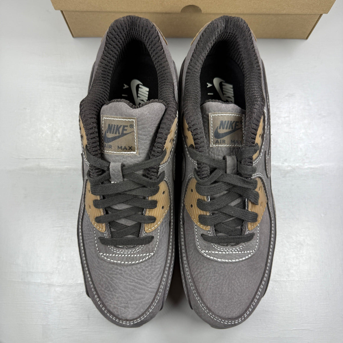Nike deck shoes brown with gum sole and logo detailing.