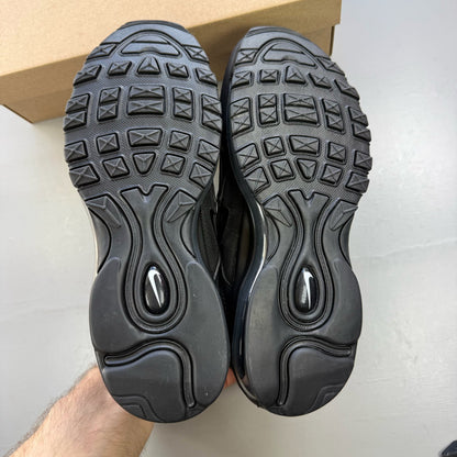 Nike Air Max 97 black low top trainers with sleek design and signature logo.