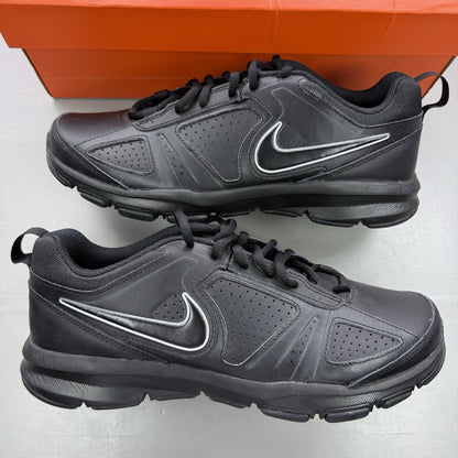 Nike black trainers with metallic silver accents and grey detailing, featuring logo on tongue.