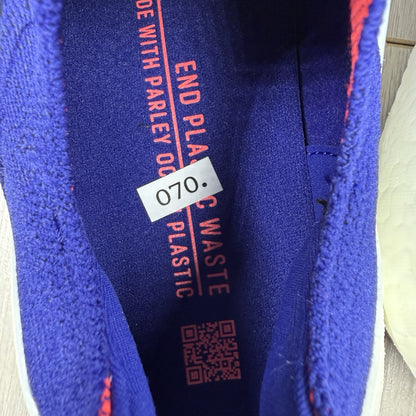 Adidas Ultra Boost 22 trainers in legacy indigo with turbo blue and white accents.