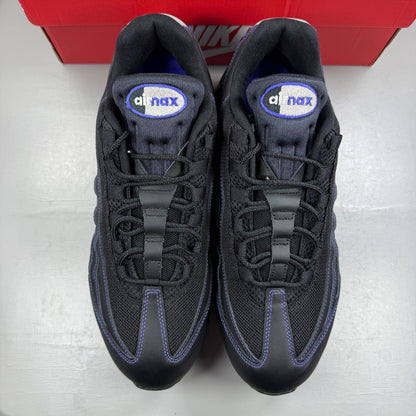 Nike Air Max 95 black sneakers with Persian Violet accents and signature logo.