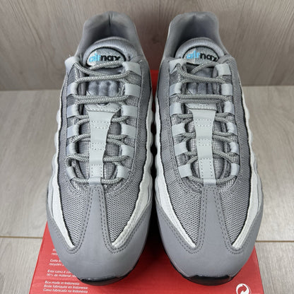 Nike Air Max 95 trainers grey with aqua blue accents and retro logo details.